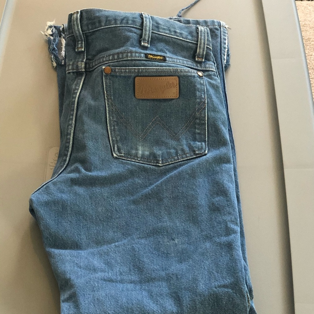 Wranglers with boot cut slits